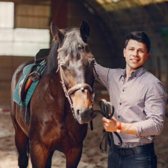 handsome-man-standing-ranch